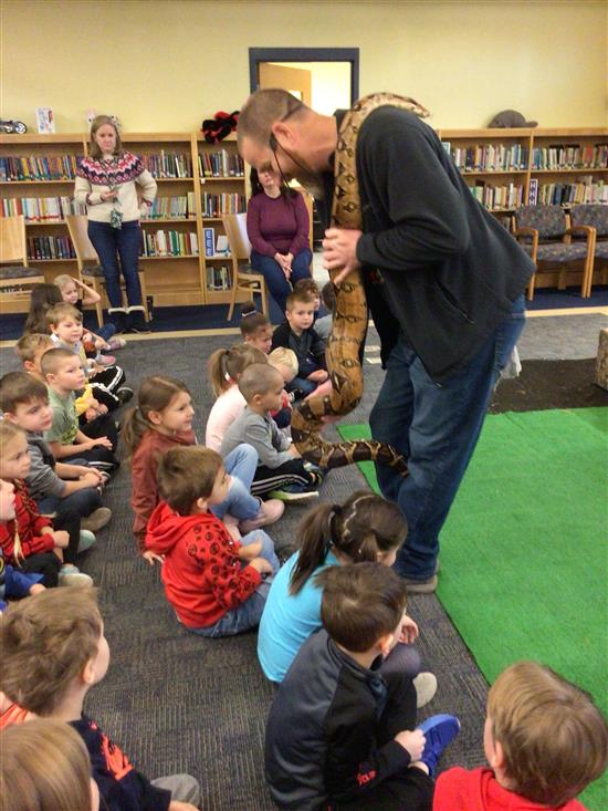 Kids touching a snake